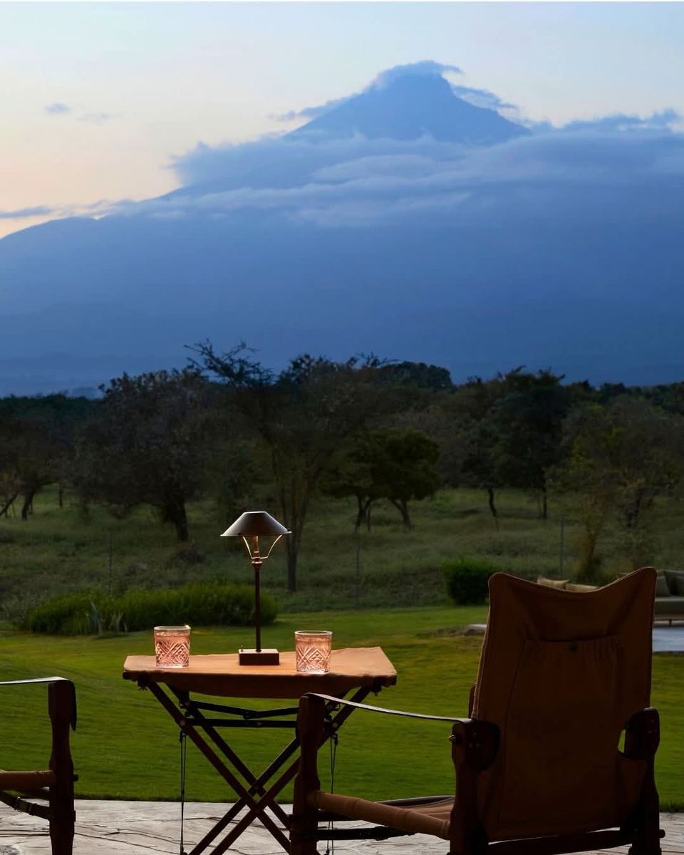 Mountain at dusk seen from a lodge terrace